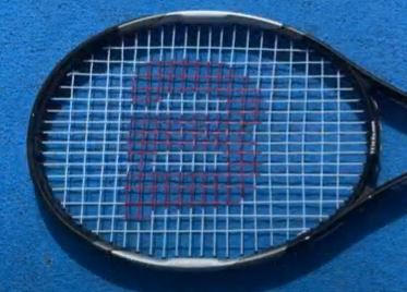 The Head Part Of A Tennis Racket