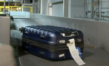 Is it possible to bring a tennis racket on a plane with checked-in baggage?